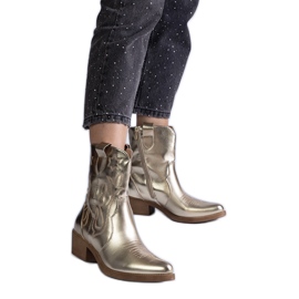 Bottes de cowboy pour femmes dorées avec bottines à talons hauts métallisées