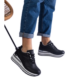 Baskets noires sur la plate-forme décorées de paillettes et une insertion métallique le noir