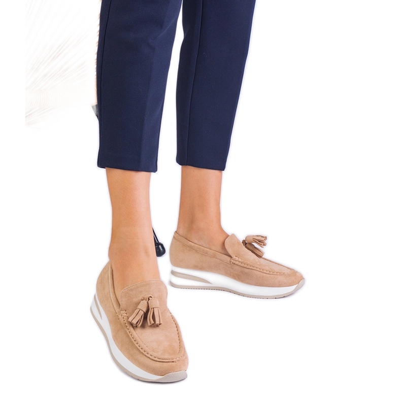 Locons pour femmes beige sur la plate-forme avec franges