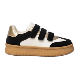 Baskets pour femmes avec des inserts métalliques en noir et blanc