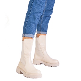 Bottes beige avec un insert de matériau