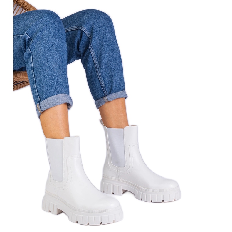 Bottes de cheville blanche avec une insertion flexible