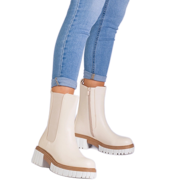 Bottes de cheville beige de l'éco-cuir