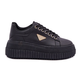 Baskets élégantes sur une plate-forme noire massive le noir