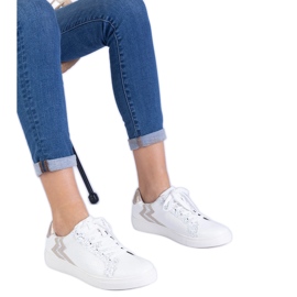 Baskets blanches pour femmes avec un gaufrage et des paillettes