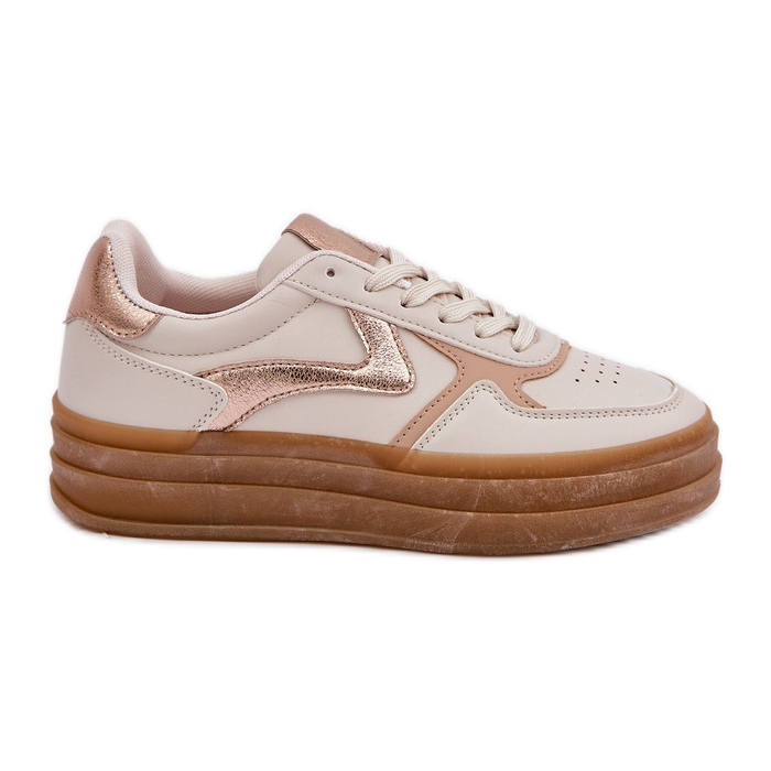 Sneakes des femmes sur la plate-forme beige Sneakes des femmes sur la plate-forme beige
