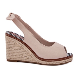 Sandales compensées beiges avec tresses