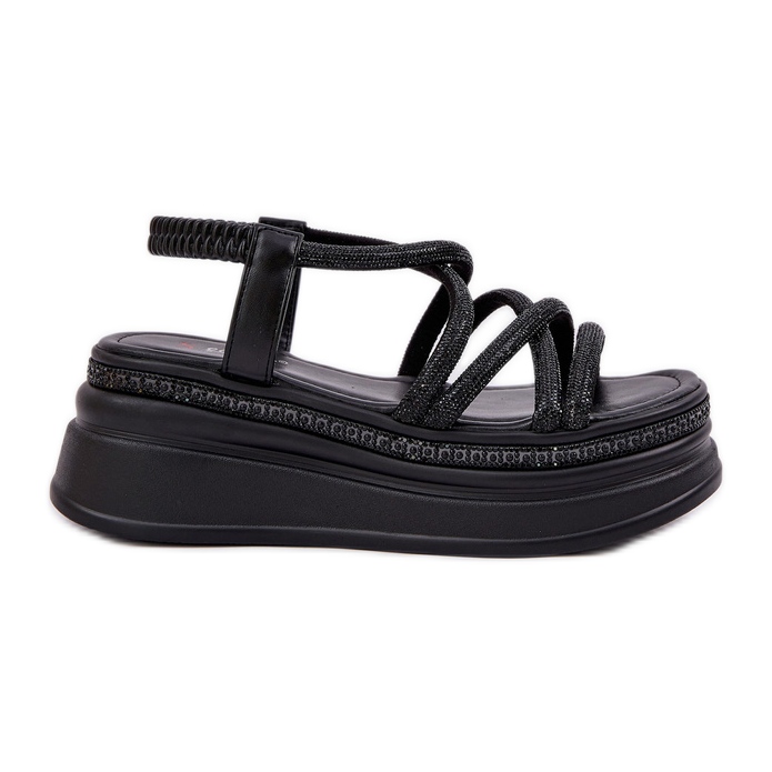 Sandales sur une plate-forme massive avec des rayures noires le noir
