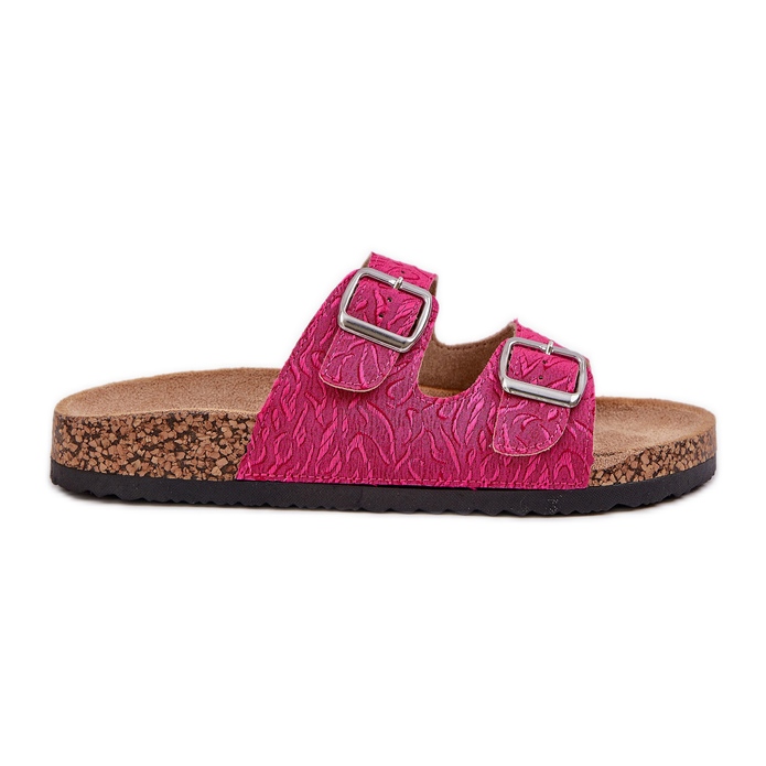 Flip de matériau -flops sur une semelle de liège avec boucles. rose