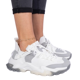 Baskets blanches pour femmes avec une tige de chaussette