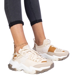 Baskets féminines beiges avec une tige de chaussette