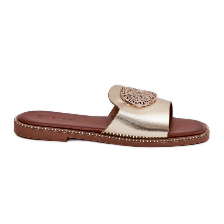 Les tongs à tobeaux en cuir écologique avec décoration dorée d'or