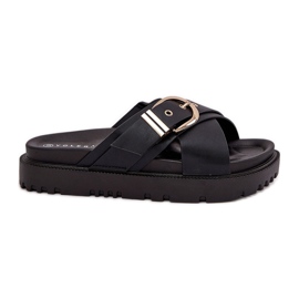 Pantoufles sur la plate-forme avec une boucle noire Pantoufles sur la plate-forme avec une boucle noire