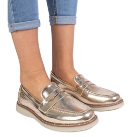 Mocassins féminins classiques dorés d'or