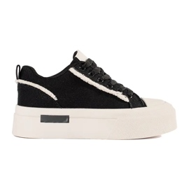 Baskets à plateforme noires et blanches le noir