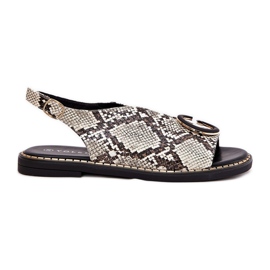 Sandales plates avec une décoration de serpent à motif en brun beige Sandales plates avec une décoration de serpent à motif en brun beige