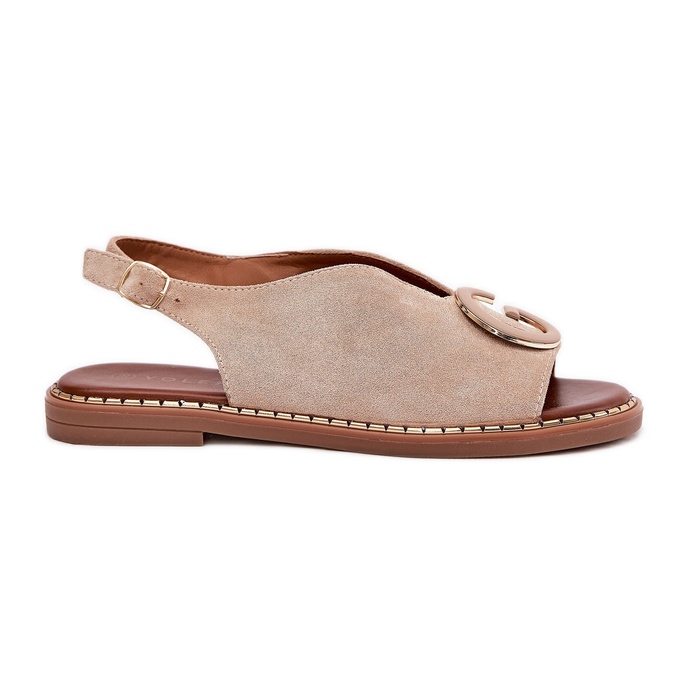 Sandales pour femmes plates avec une décoration beige