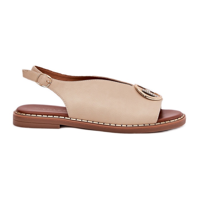 Sandales plates élégantes avec une décoration beige