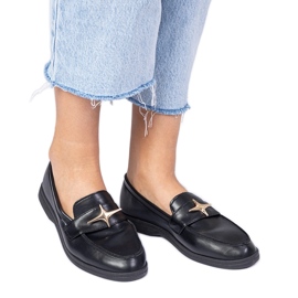 Mocassins noirs pour femmes avec décoration dorée