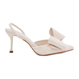 Talons hauts et arc ecru blanc