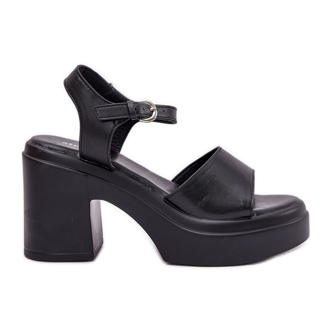 Sandales féminines sur un poste et une plate-forme massive avec un noir en cuir écologique le noir