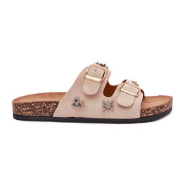Slippers pour femmes sur une semelle de liège avec boucles et épingles beige