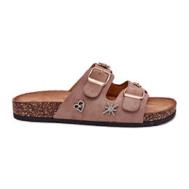 Les tongs des femmes sur une semelle de liège avec des boucles et des épingles kaki beige