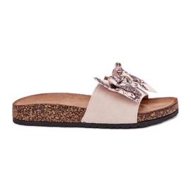 Slippers pour femmes avec un arc sur une plate-forme en liège beige