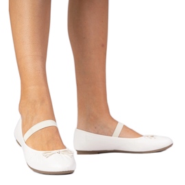 Ballerines féminines blanches avec un arc