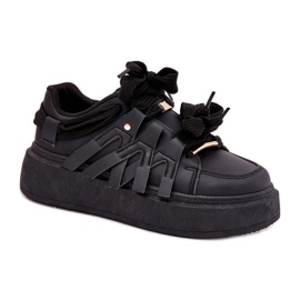 Baskets en cuir eco sur la plate-forme noire le noir