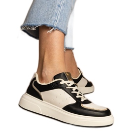 Baskets pour femmes noires avec un accessoire scintillant le noir