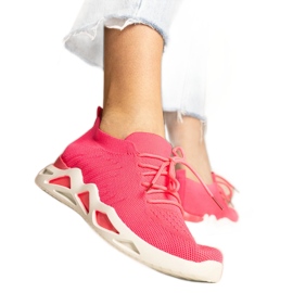 Baskets féminines roses avec une tige de chaussette