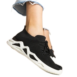 Baskets pour femmes noires avec une tige à la chaussette le noir