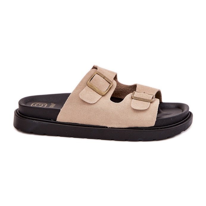 Les tongs pour femmes sur la plate-forme avec des boucles beige