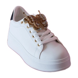 Baskets en noir et blanc décorées d'un papillon avec des zircons