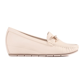 Goodin Mandards beige sur un coin bas avec un ornement Goodin Mandards beige sur un coin bas avec un ornement