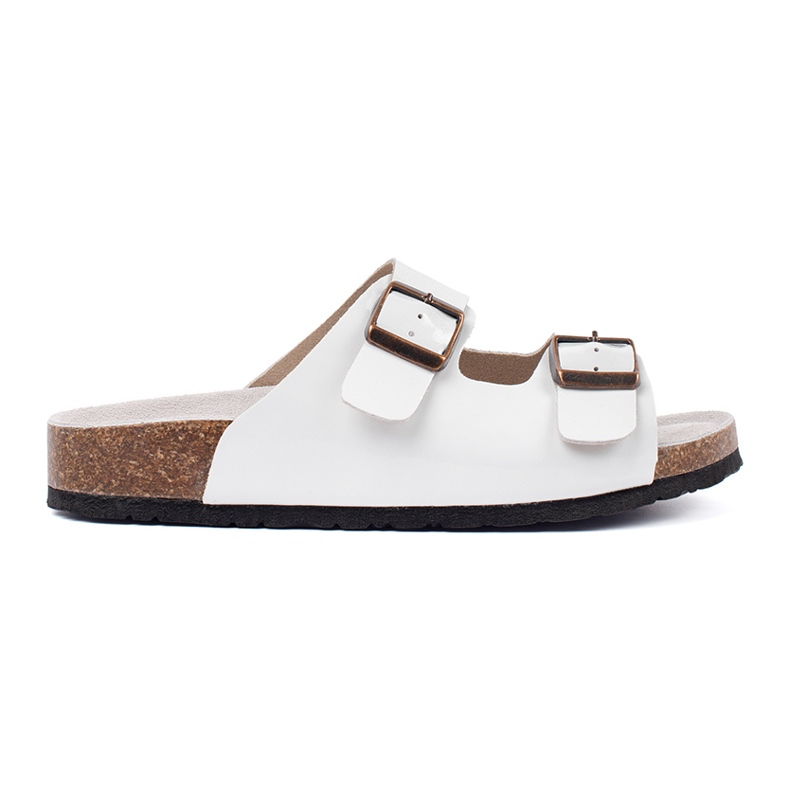 Goodin Les tongs blancs sur une semelle plate blanche