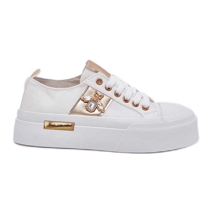 Baskets pour femmes sur la plate-forme avec un détail décoratif blanc blanche