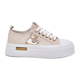Baskets pour femmes sur la plate-forme avec des détails décoratifs beige Baskets pour femmes sur la plate-forme avec des détails décoratifs beige