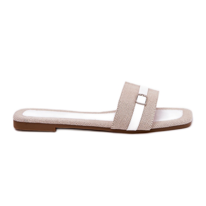 Les tongs plats des femmes avec une ceinture et boucle blanc beige et boucle Les tongs plats des femmes avec une ceinture et boucle blanc beige et boucle