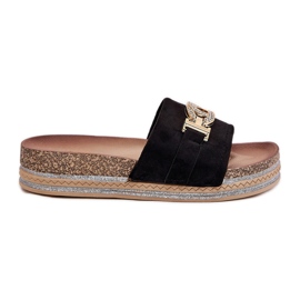 Les tongs pour femmes avec un détail doré sur la plate-forme avec du noir de Brocade le noir