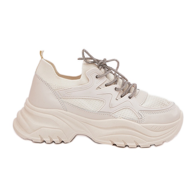 Baskets féminines sur une plate-forme décorative Laçage beige