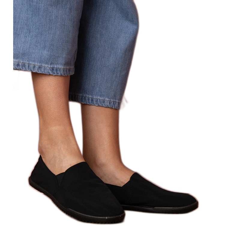 Slip des femmes noires - baskets le noir