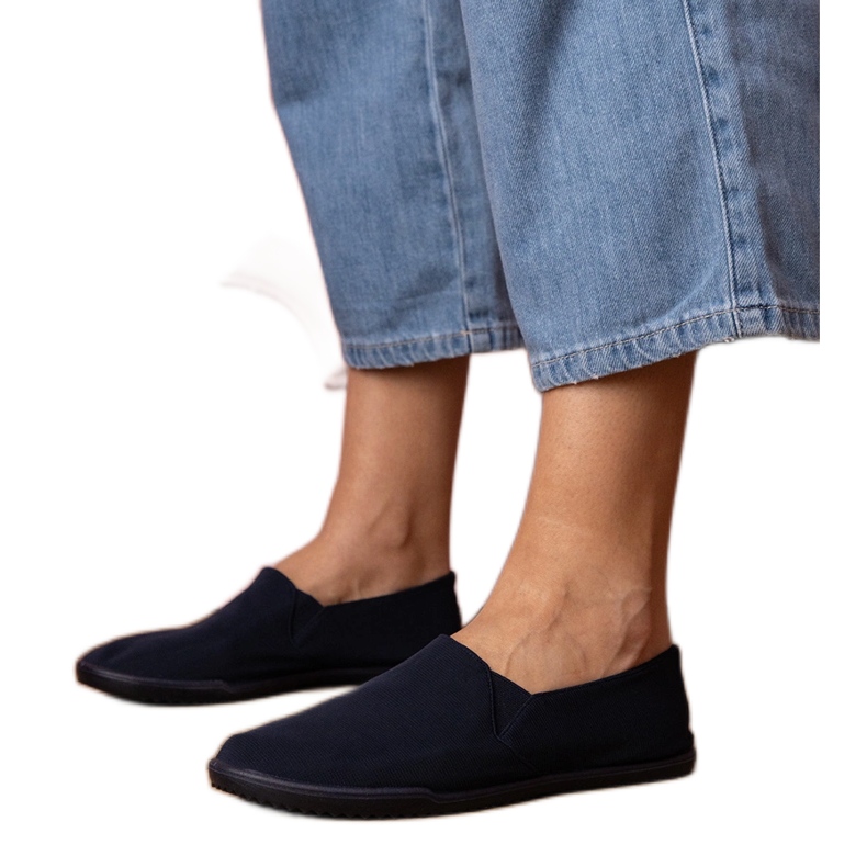 Les greniers de granine féminins sont des baskets bleu