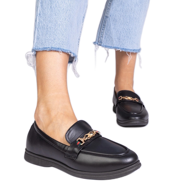 Mocassins noirs avec décoration dorée le noir