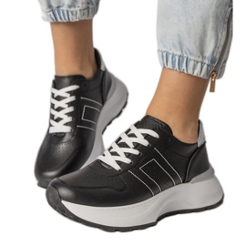 Baskets sportives noires avec un insert en argent le noir