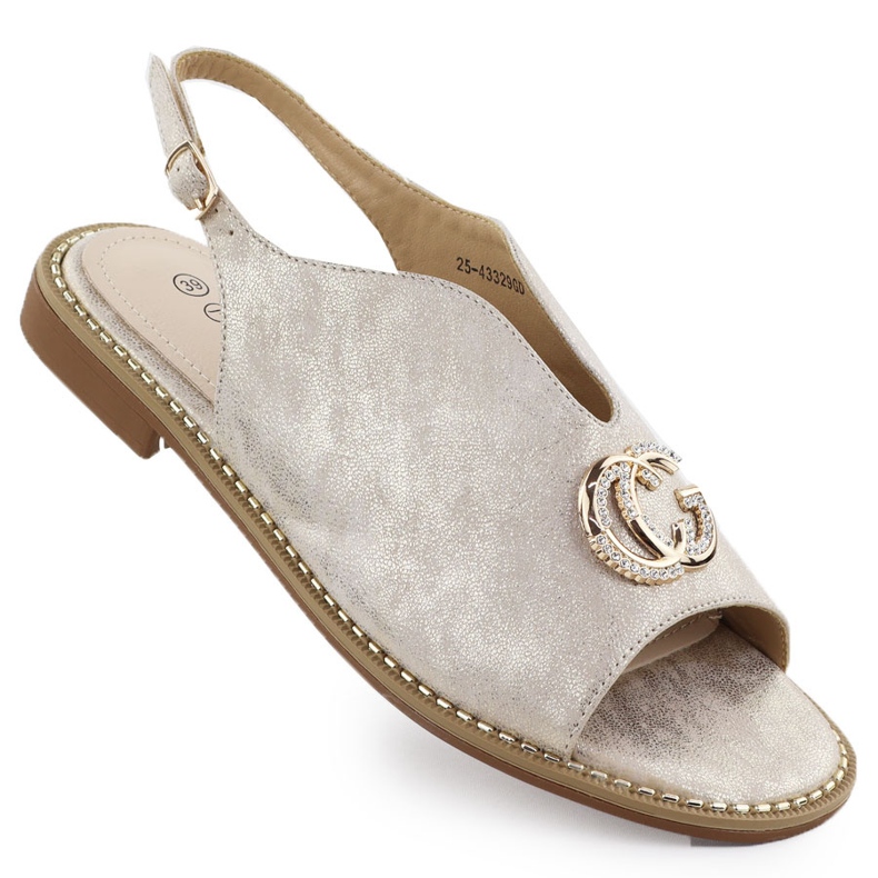 Les sandales féminines sont construites avec un ornement de 43329 Golden Potocki d'or