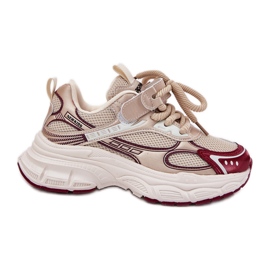 Baskets pour enfants sur une semelle dorée épaisse