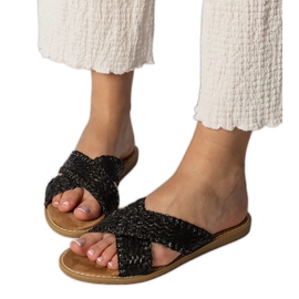 Slippers des femmes noires le noir