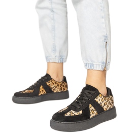 Baskets féminines à pantalon noir le noir